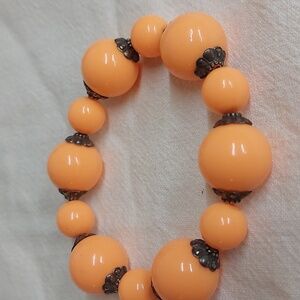 Big funky chunky orange braclet